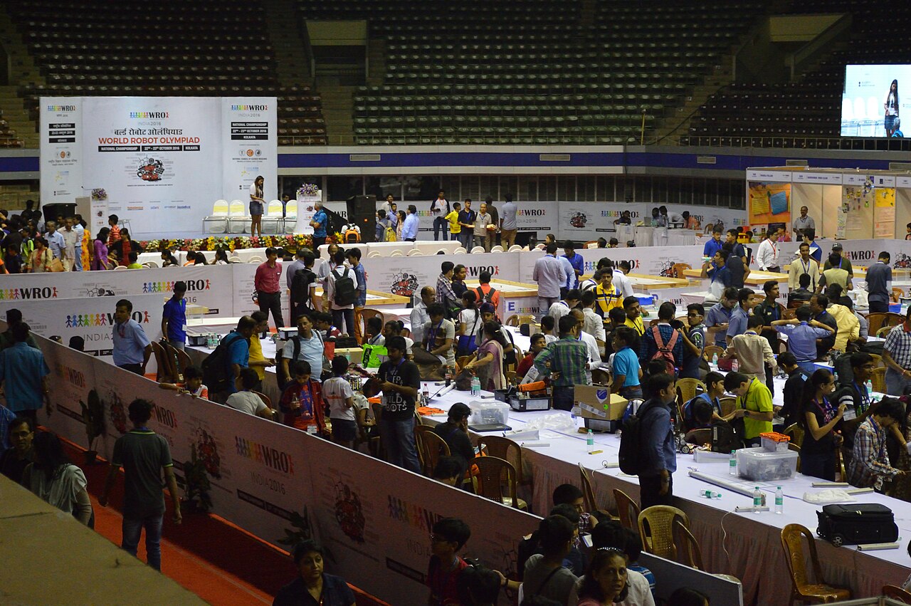 Indian school students building and programming robots at the World Robot Olympiad in India